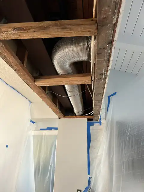 Small soffit water damage repair. Finish items protection, Demolition, drywall hanging, taping, corners application, matching existing texture and clean up. 2026 project photo